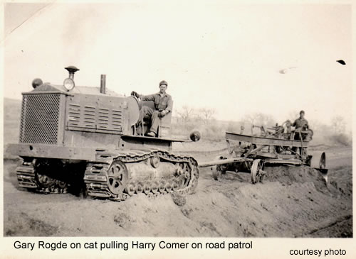 Gary Rogde on cat pulling Harry Comer on road patrol