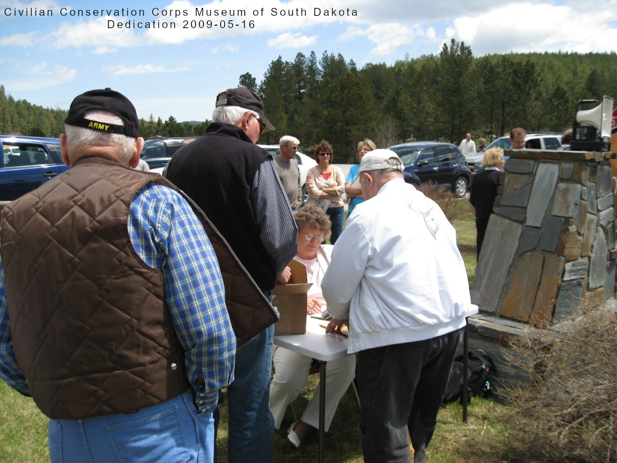 visitors getting Peggy Sanders CCC book