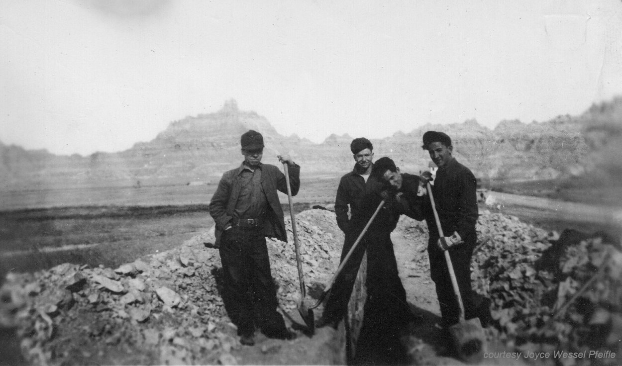 4 men with shovels