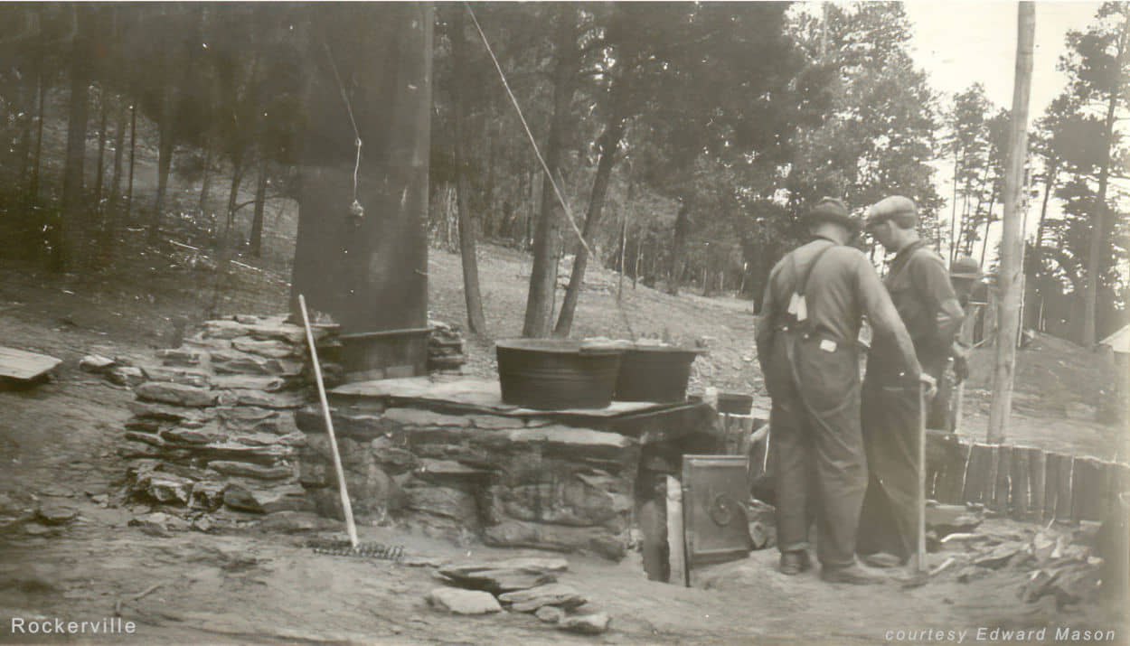 2 men by a stove Rockerville