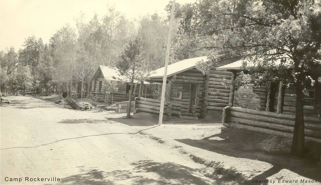 road past log cabins