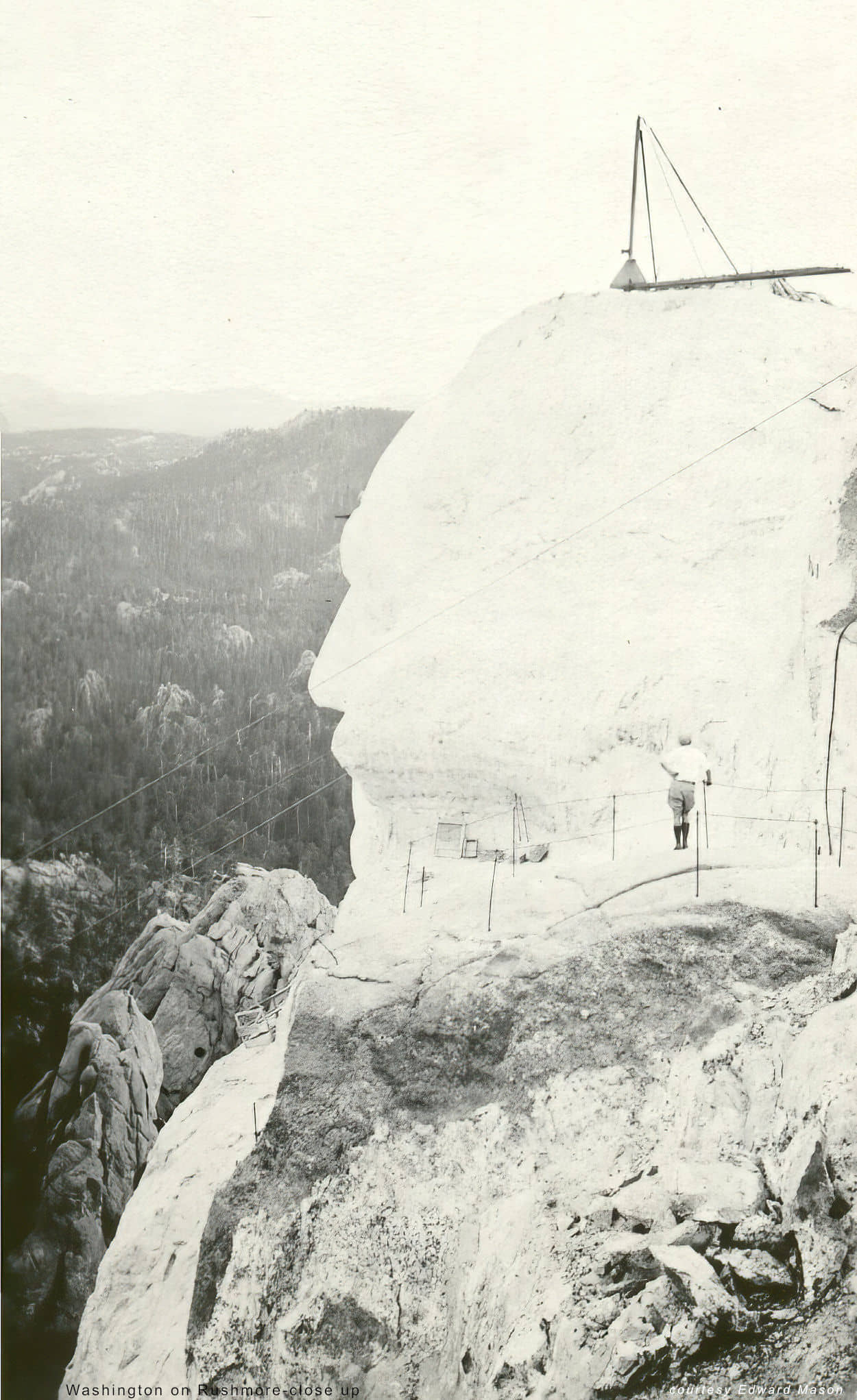 man viewing Washington on Mt Rushmore