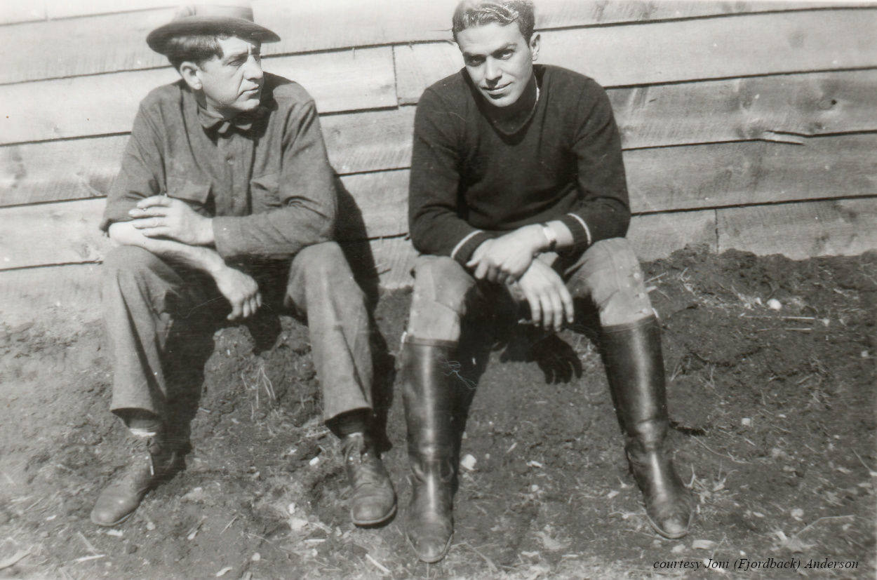 Tweo men talking by the barracks